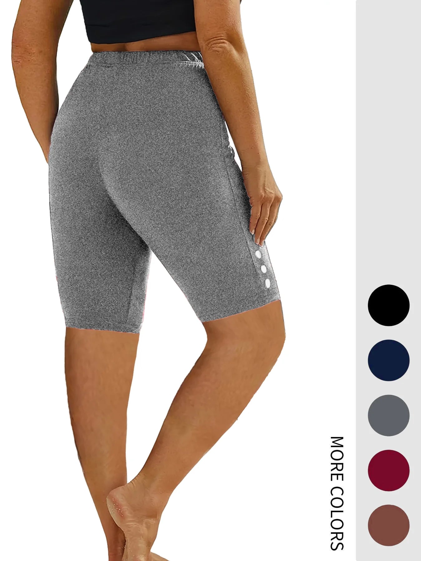 Plus-size 5-quarter pants with button embellishments and elastic waistband for fitness, capri, and running.