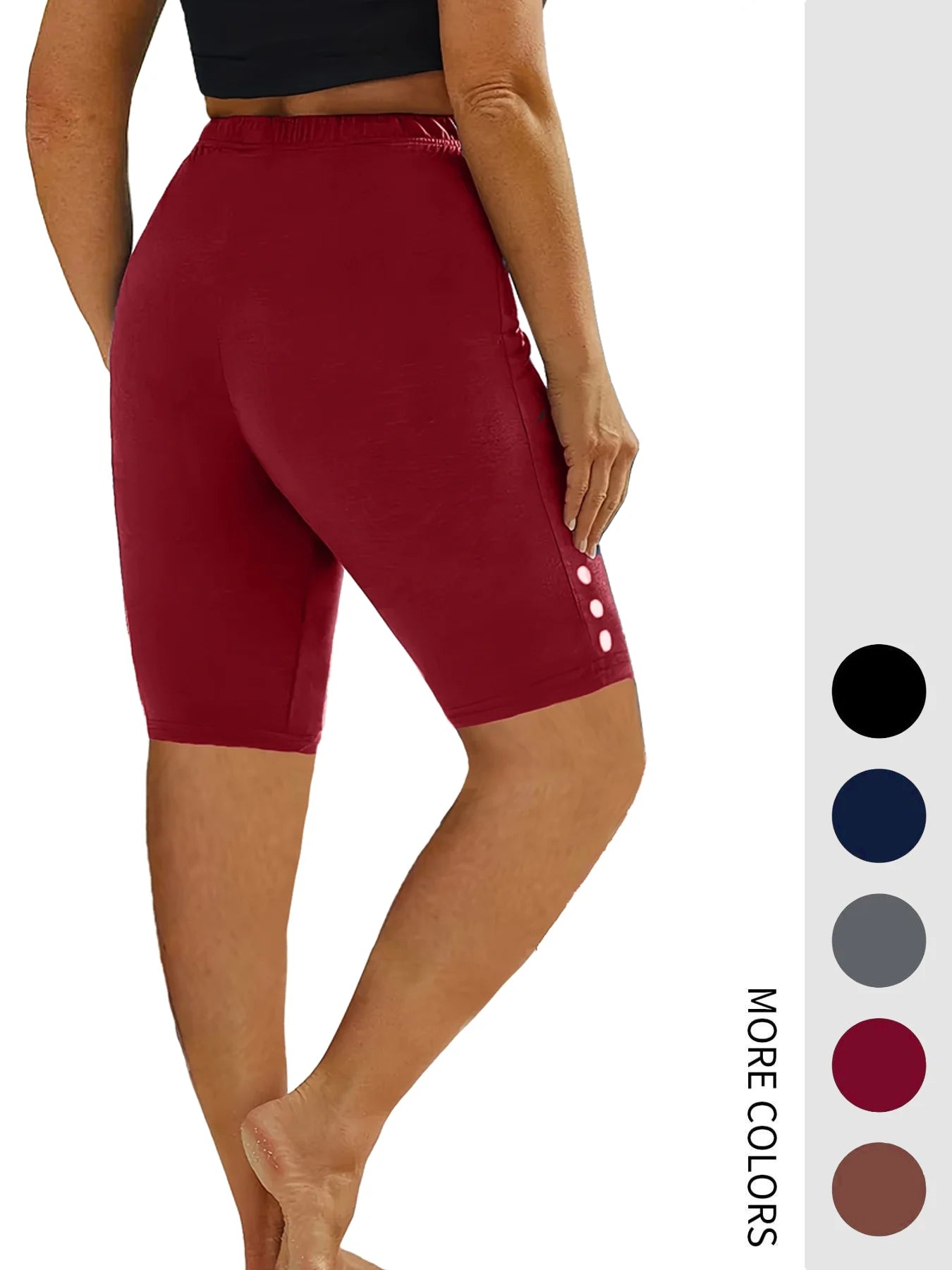 Plus-size 5-quarter pants with button embellishments and elastic waistband for fitness, capri, and running.