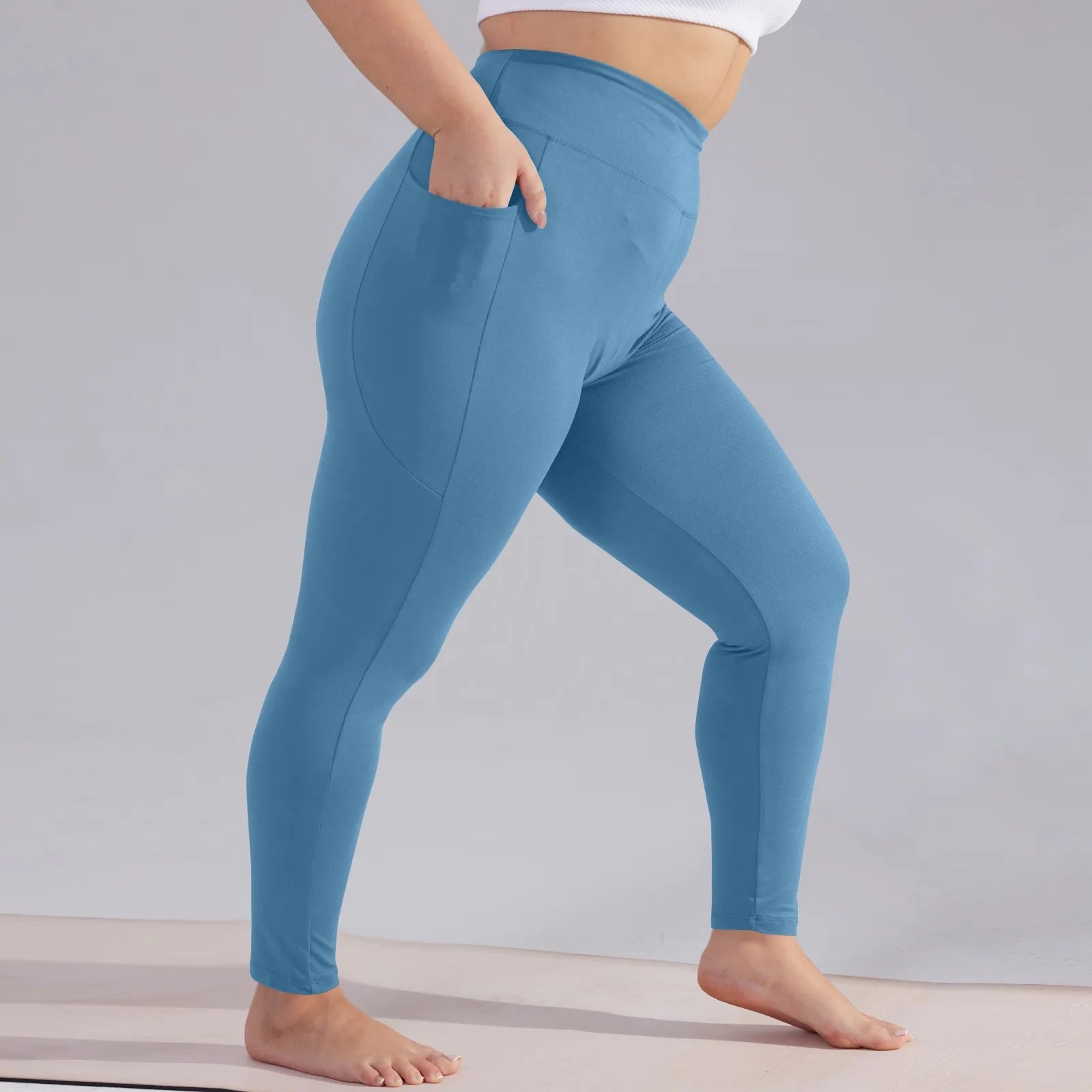 Plus size yoga pants women high waisted hip lift athletic leggings slim sports capri pants with pockets solid color sweatpants