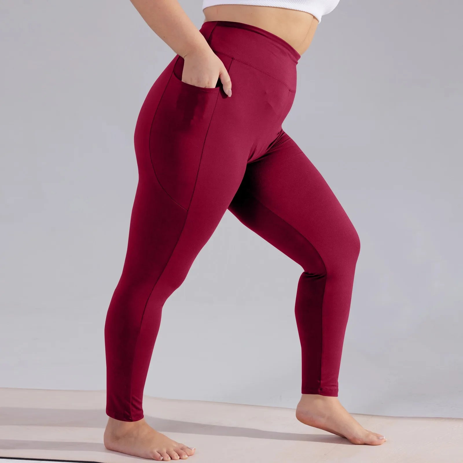 Plus size yoga pants women high waisted hip lift athletic leggings slim sports capri pants with pockets solid color sweatpants